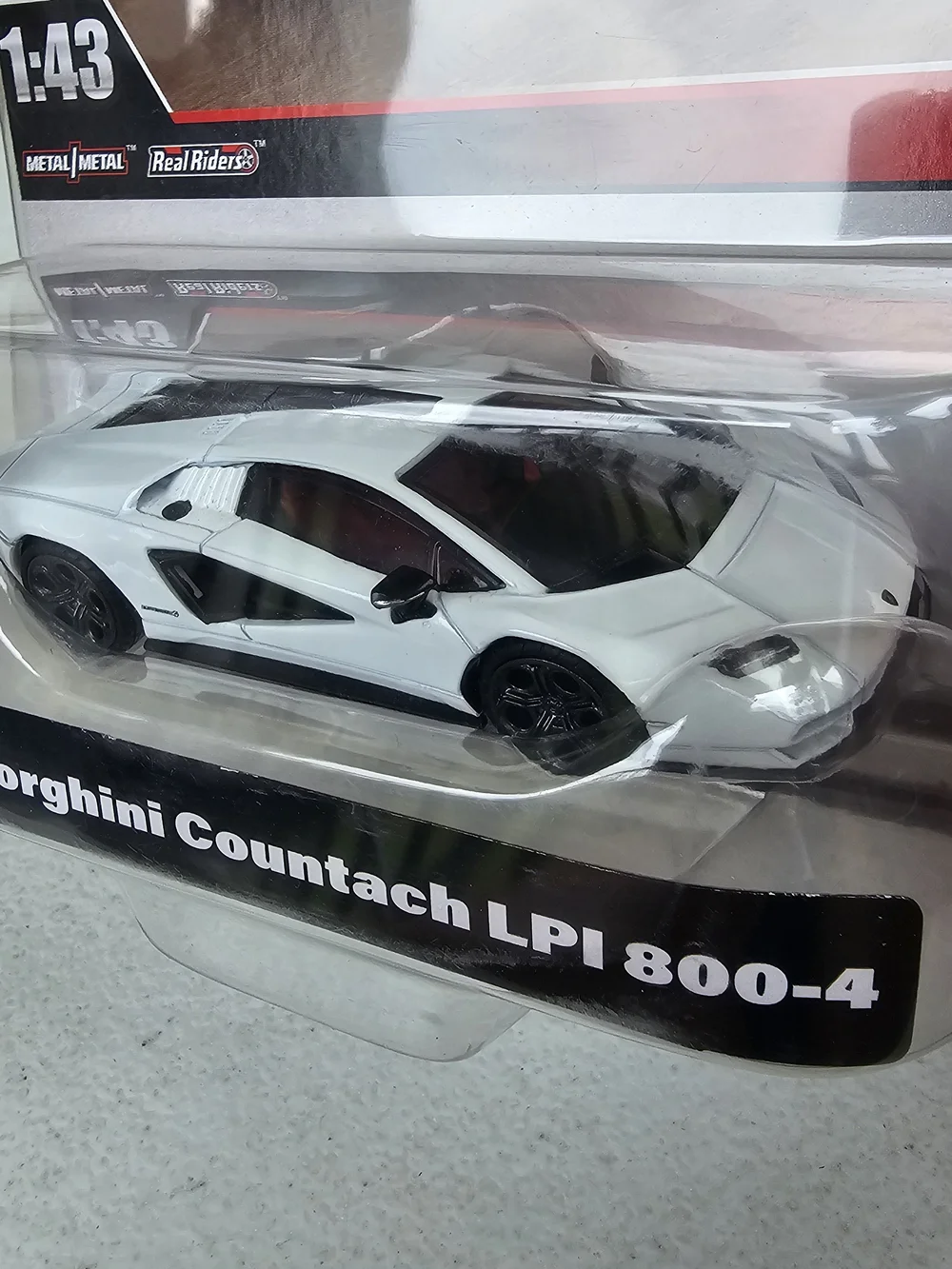 Riders by Lee White & Black Lamborghini Countach LPI 800-4 Die-Cast Toy